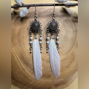 Silver floret chandelier dangle earrings with howlite gem beads/white feathers